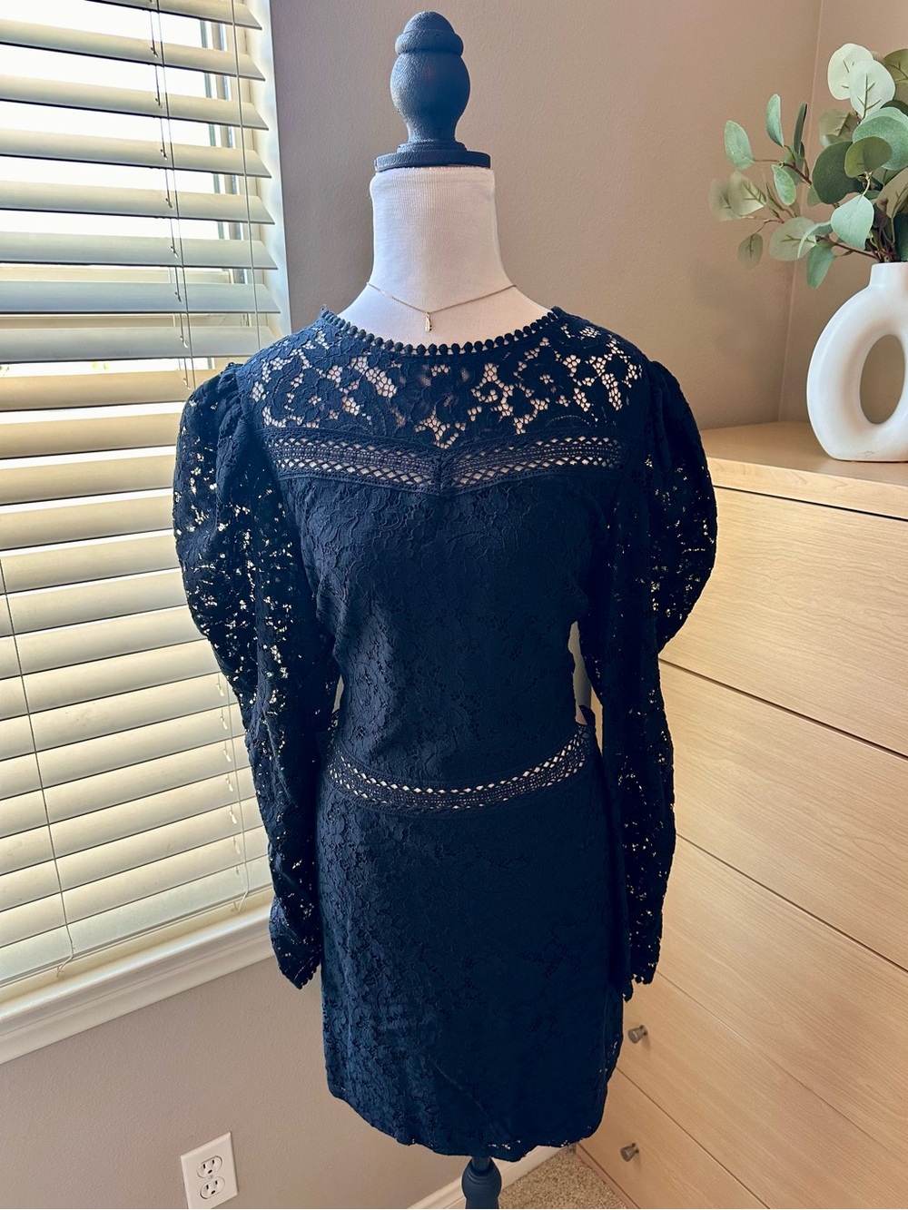 Black lace dress with waist cut-outs
